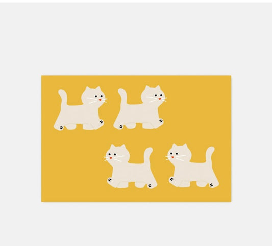 Cat steps Mat